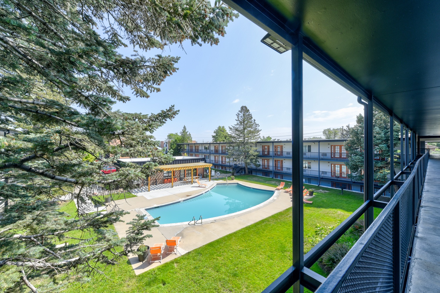 The Lodge pool deck viewed from a resident balcony